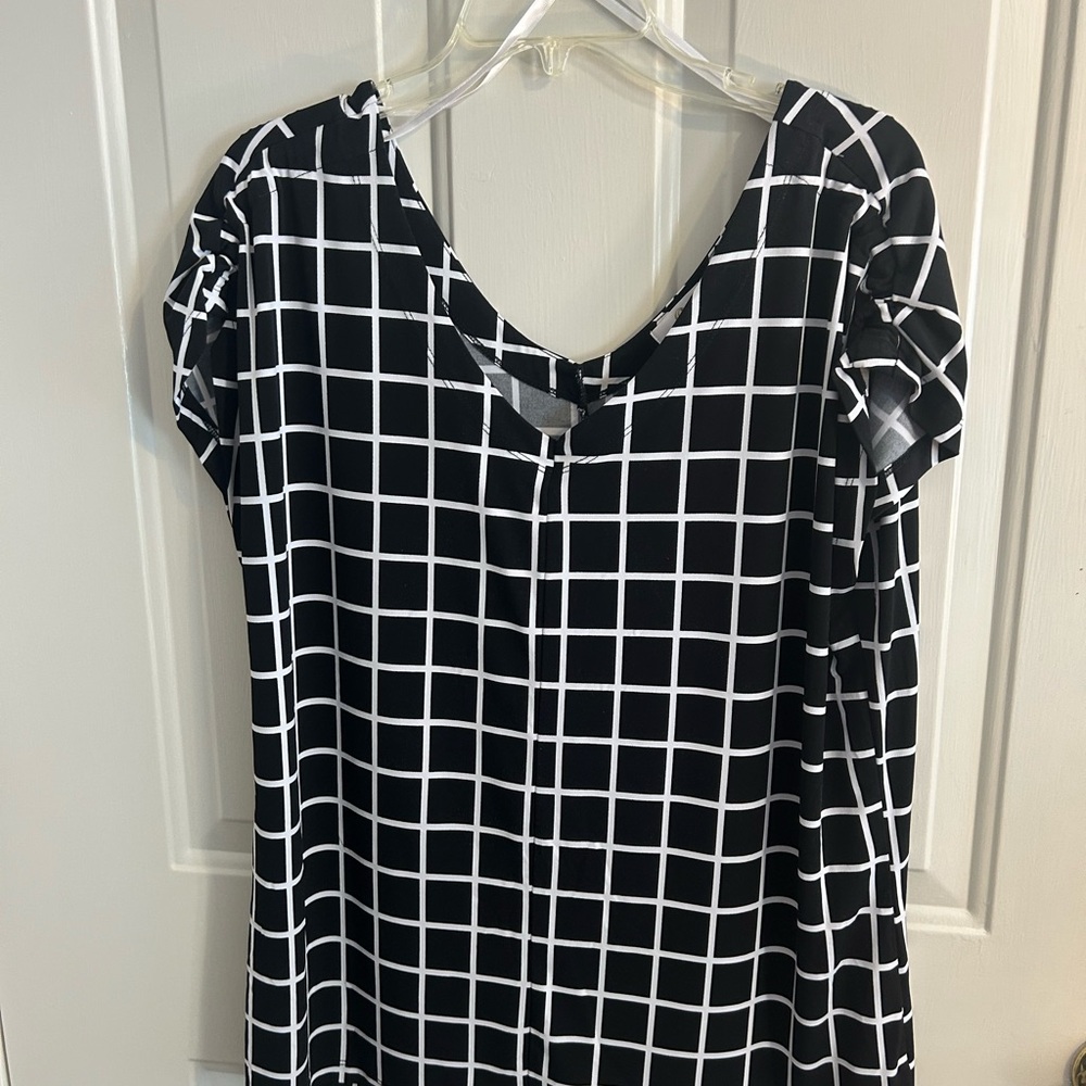 C. Black and White Boxy Blouse with Grid Pattern